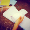 How to Scrapbook with Children kaboompics.com_Notebook in hands filter
