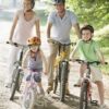 10 Fitness tips for the whole Family Family sitting on bikes on path smiling