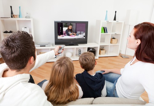 Children closely watching the TV - Stock Image - M830/0405 - Science Photo  Library